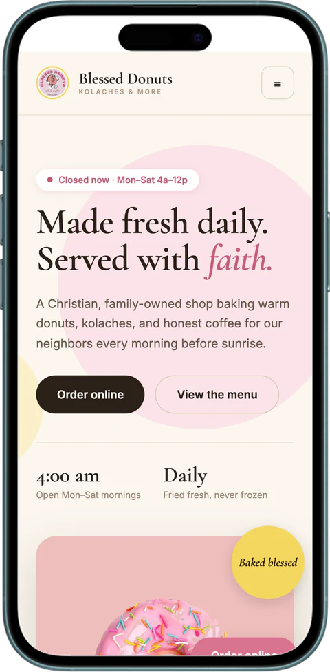 Blessed Donuts, Kolaches & More website on a phone